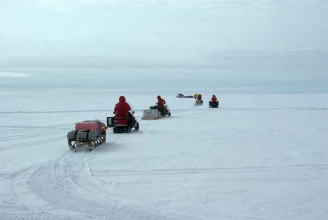 snowmobiles leaving